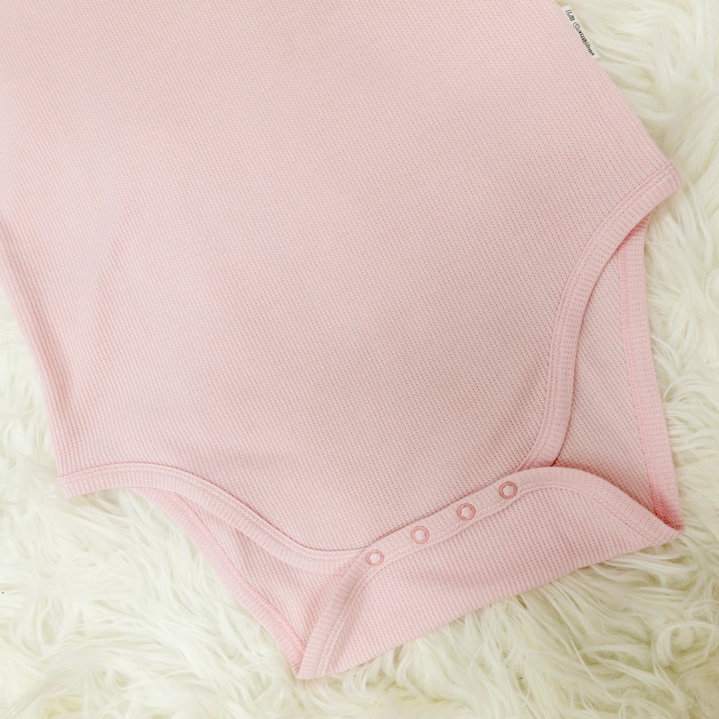 Blush Ribbed Onesie